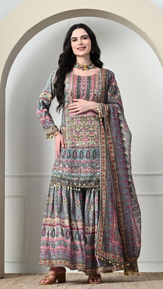 Beautiful Printed Suit With Heavy Tassel Work